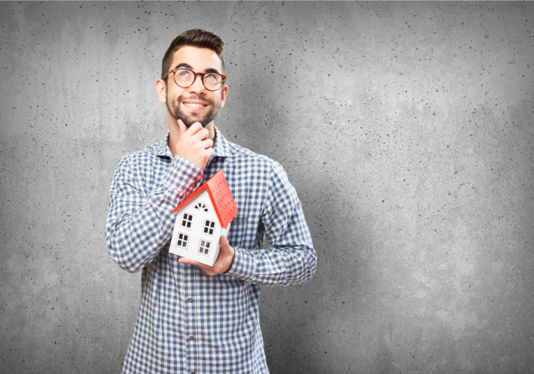 man holding a house