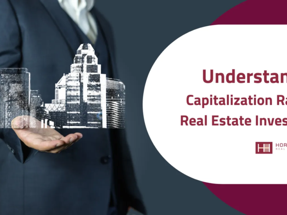 A business professional holding a holographic cityscape, representing the concept of capitalization rates in real estate investment.